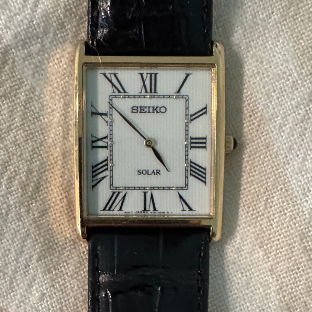 Seiko Gold Case with Black Strap Watch